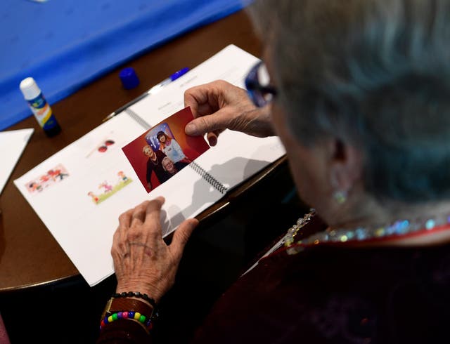 <p>A patient affected by Alzheimer's disease attends a special therapeutic session</p>
