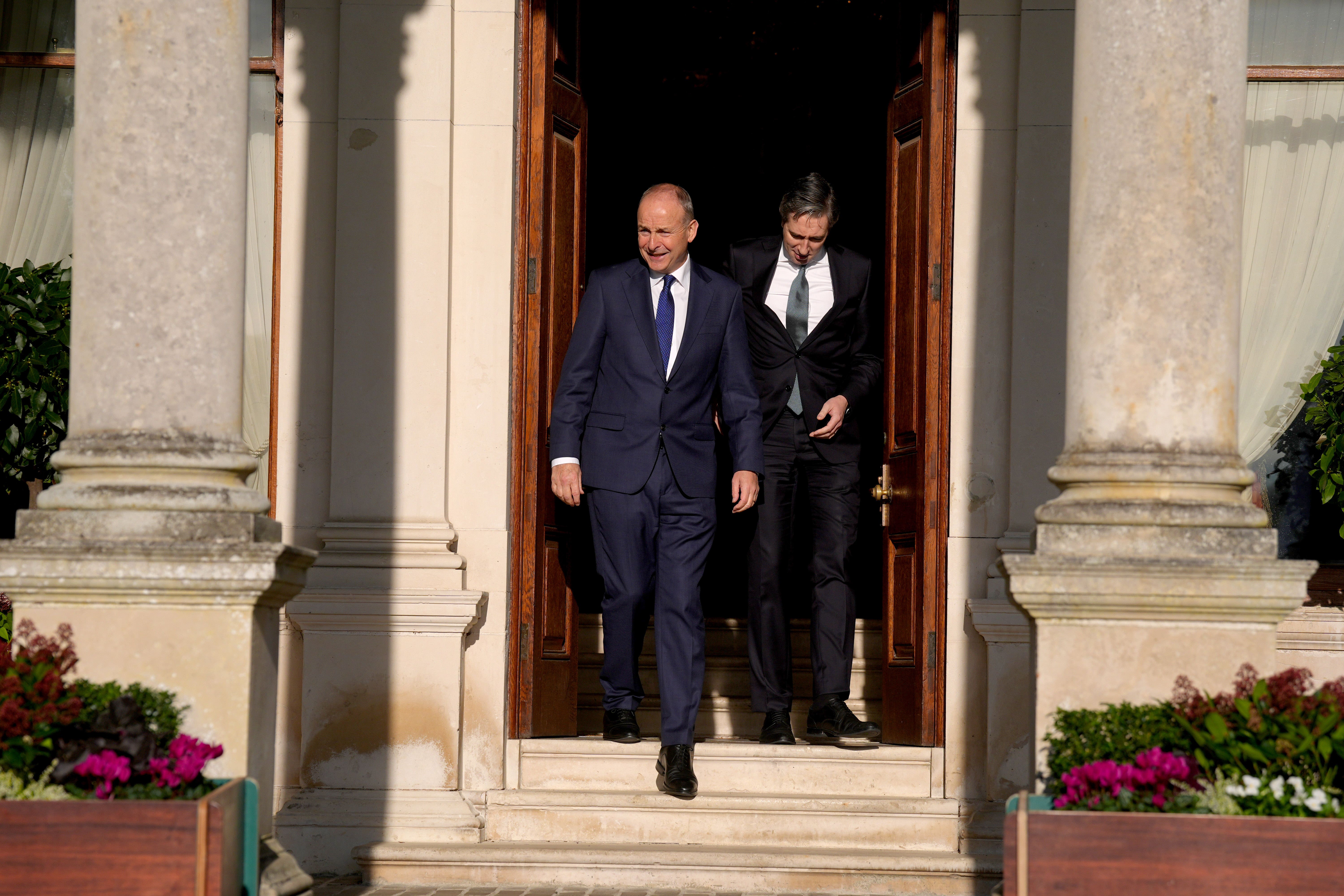 Taoiseach Micheal Martin (left) and Tanaiste Simon Harris (Brian Lawless/PA)