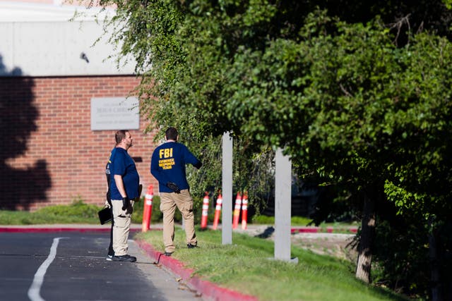 <p>FBI agents investigating a crime scene</p>