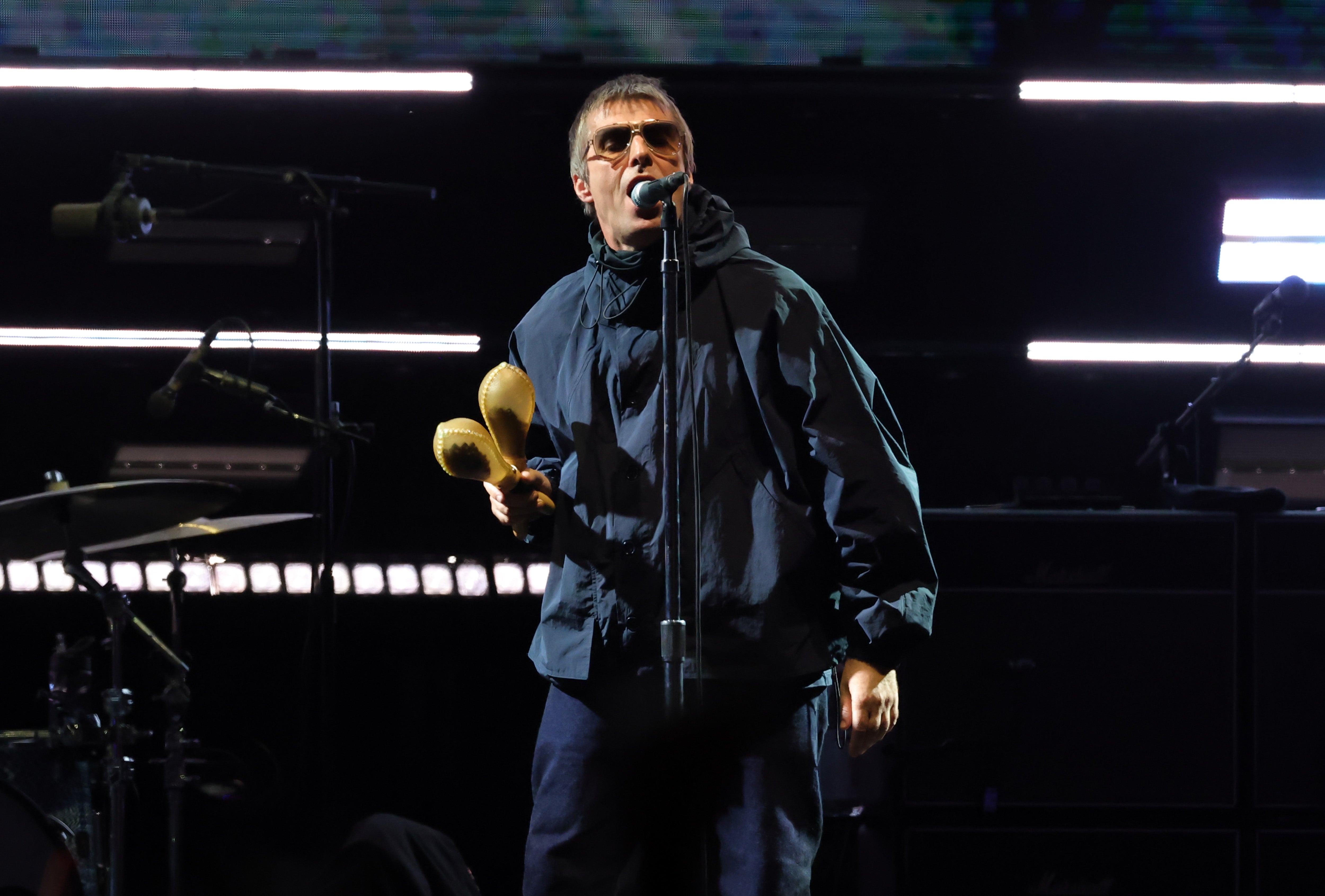 Gallagher performing with Oasis