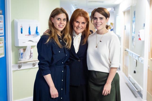 <p>Sarah Ferguson with her daughters Princess Beatrice and Princess Eugenie, whose titles remain unaffected following the latest development affecting their father, Andrew (Aaron Chown/PA)</p>