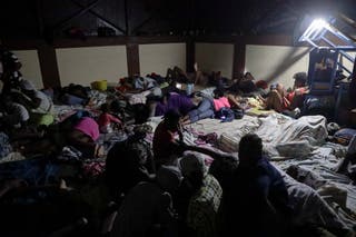 People evacuate as rains of Hurricane Melissa batter Les Cayes