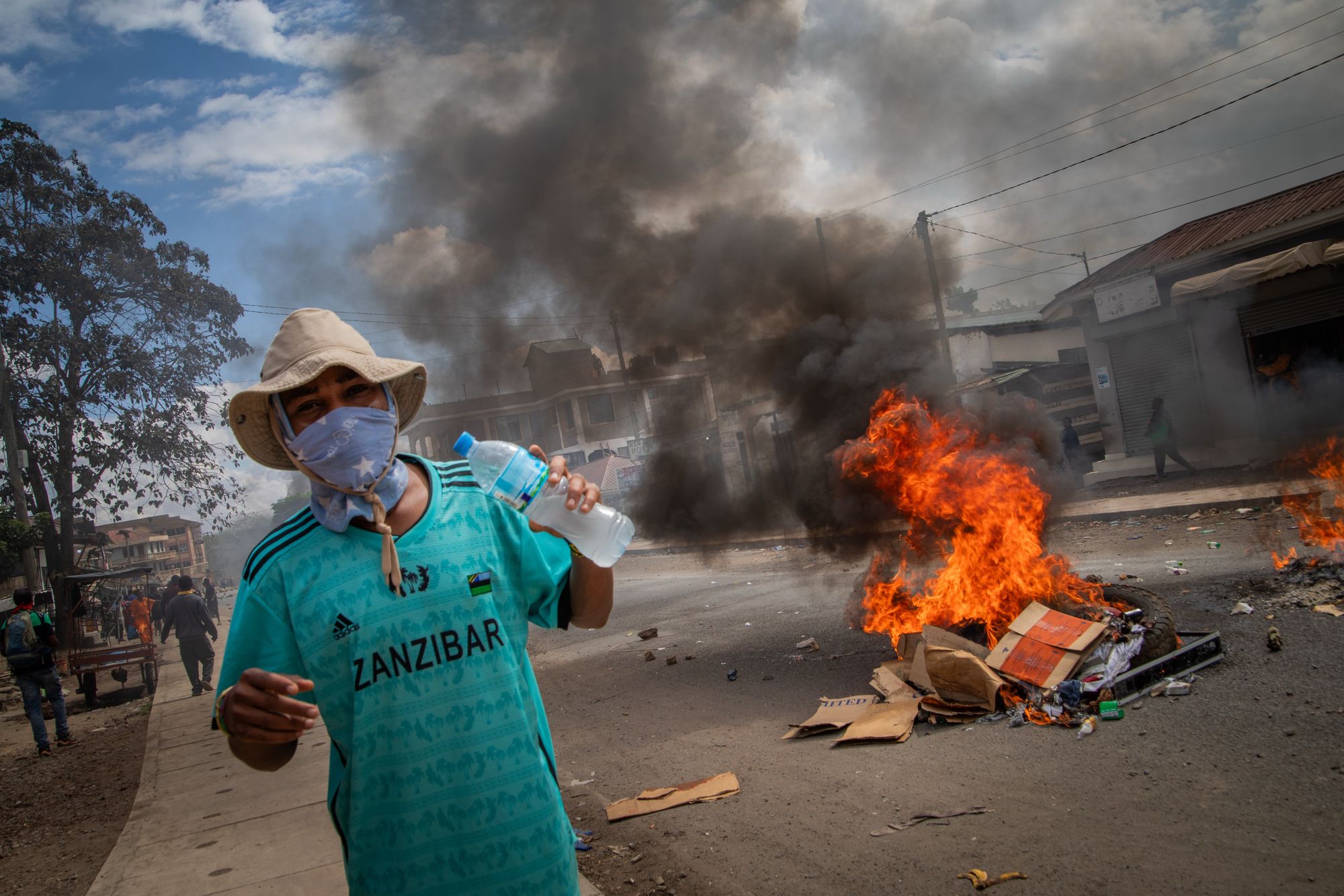 People protest in the streets of Arusha, Tanzania, on election day.