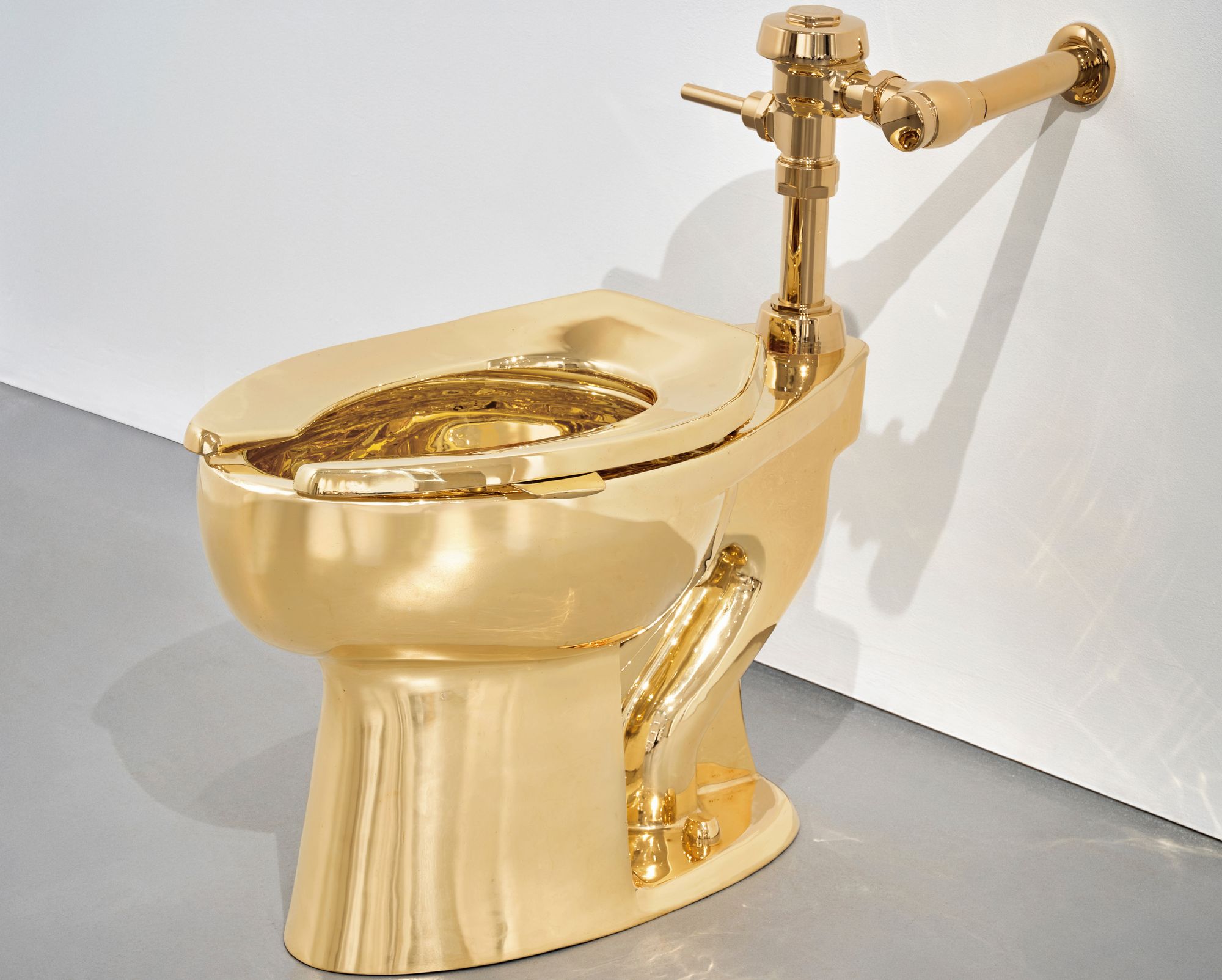 <p>Sotheby's has announced it will auction a solid gold toilet, a sculpture by Italian artist Maurizio Cattelan called ‘America’</p>