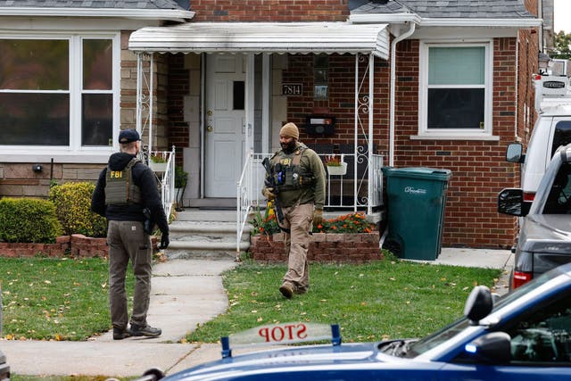 <p>Members of the FBI Joint Terrorism Task Force search a home in Dearborn, Michigan, on October 31, 2025 </p>