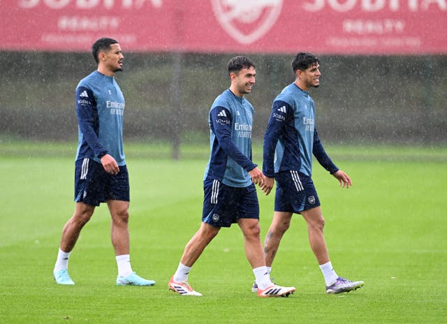<p>William Saliba, Martin Zubimendi and Piero Hincapie of Arsenal during a training session at Sobha Realty Training Centre</p>