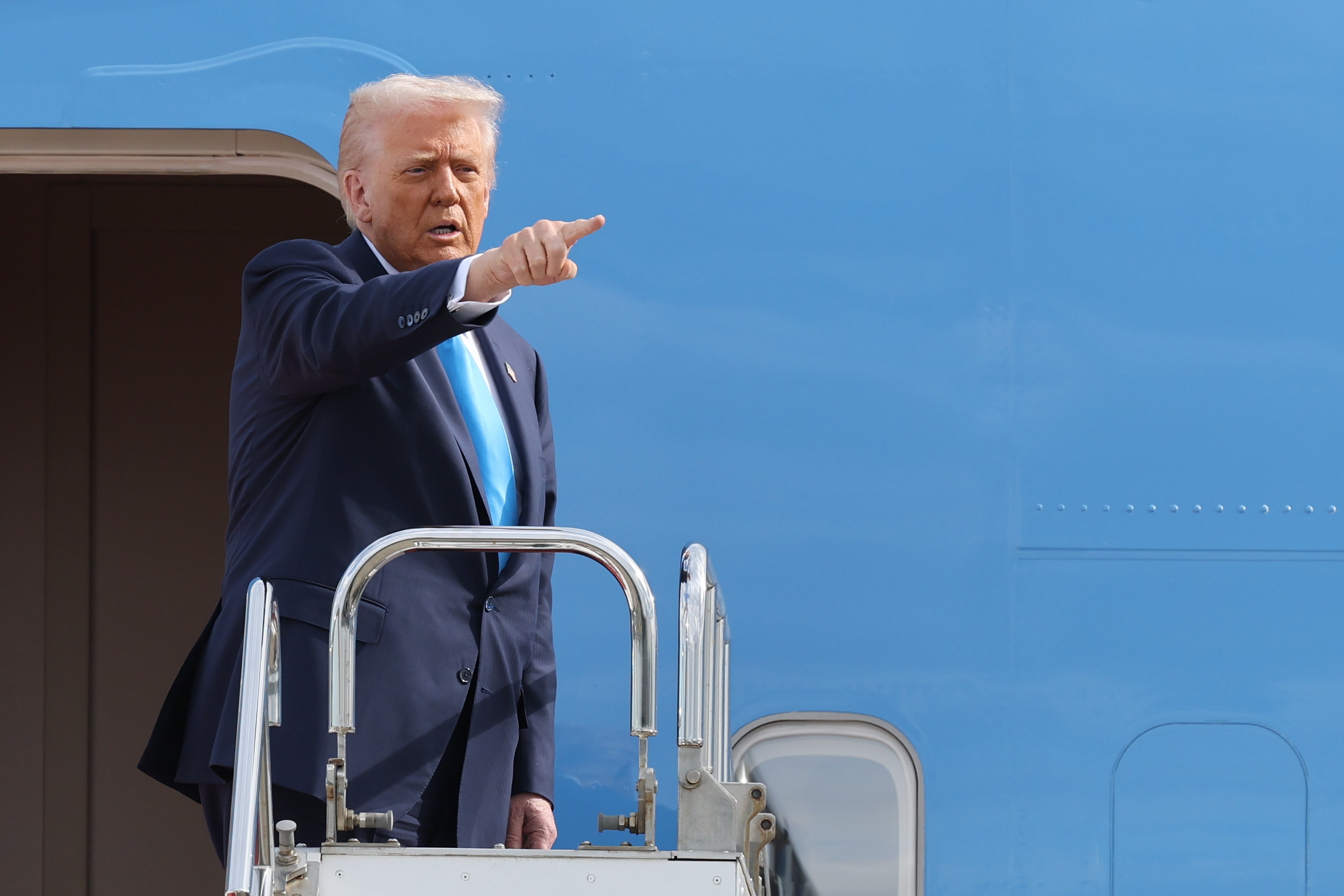 <p>U.S. President Donald Trump boards Air Force One at Haneda Airport in Tokyo for his departure to South Korea, Wednesday, Oct. 29, 2025</p>
