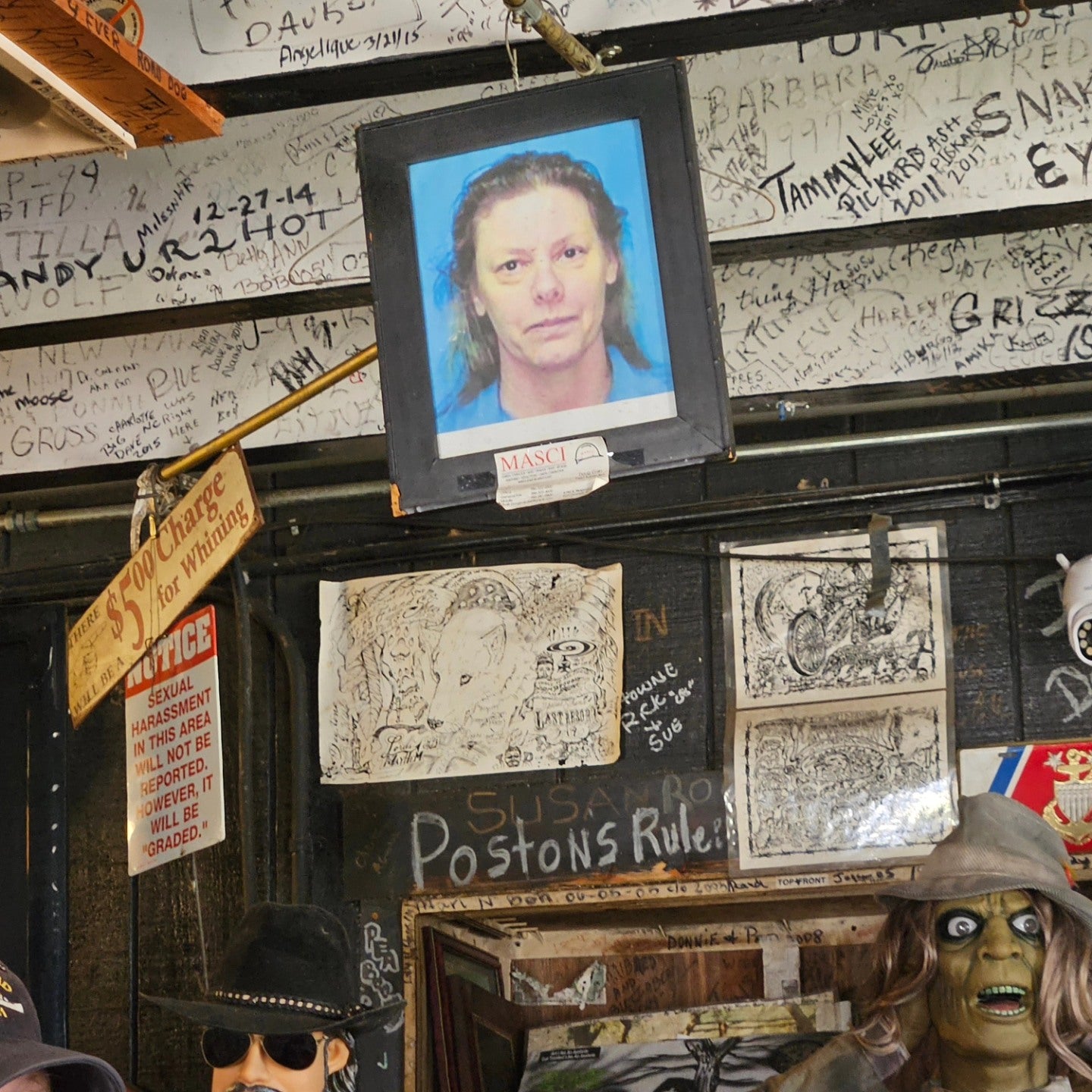 A framed mugshot of the infamous serial killer sits behind the bar where she ordered her last beer