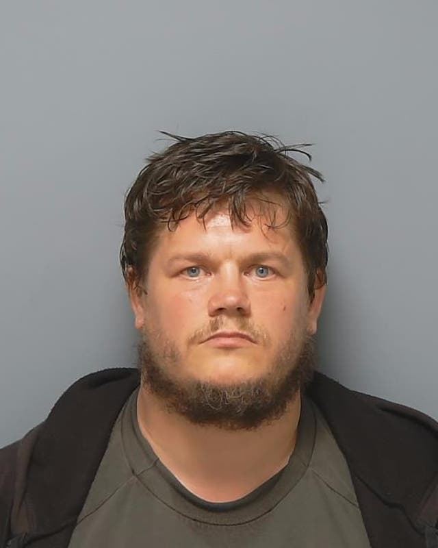 <p>Undated handout photo issued by Hampshire Police of Lee Comley, 39</p>