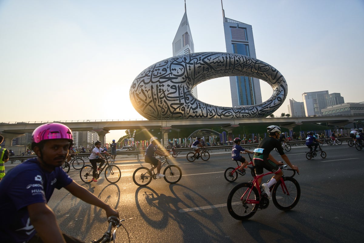 Thousands of bicycles take over Dubais busiest highway as part of a fitness challenge