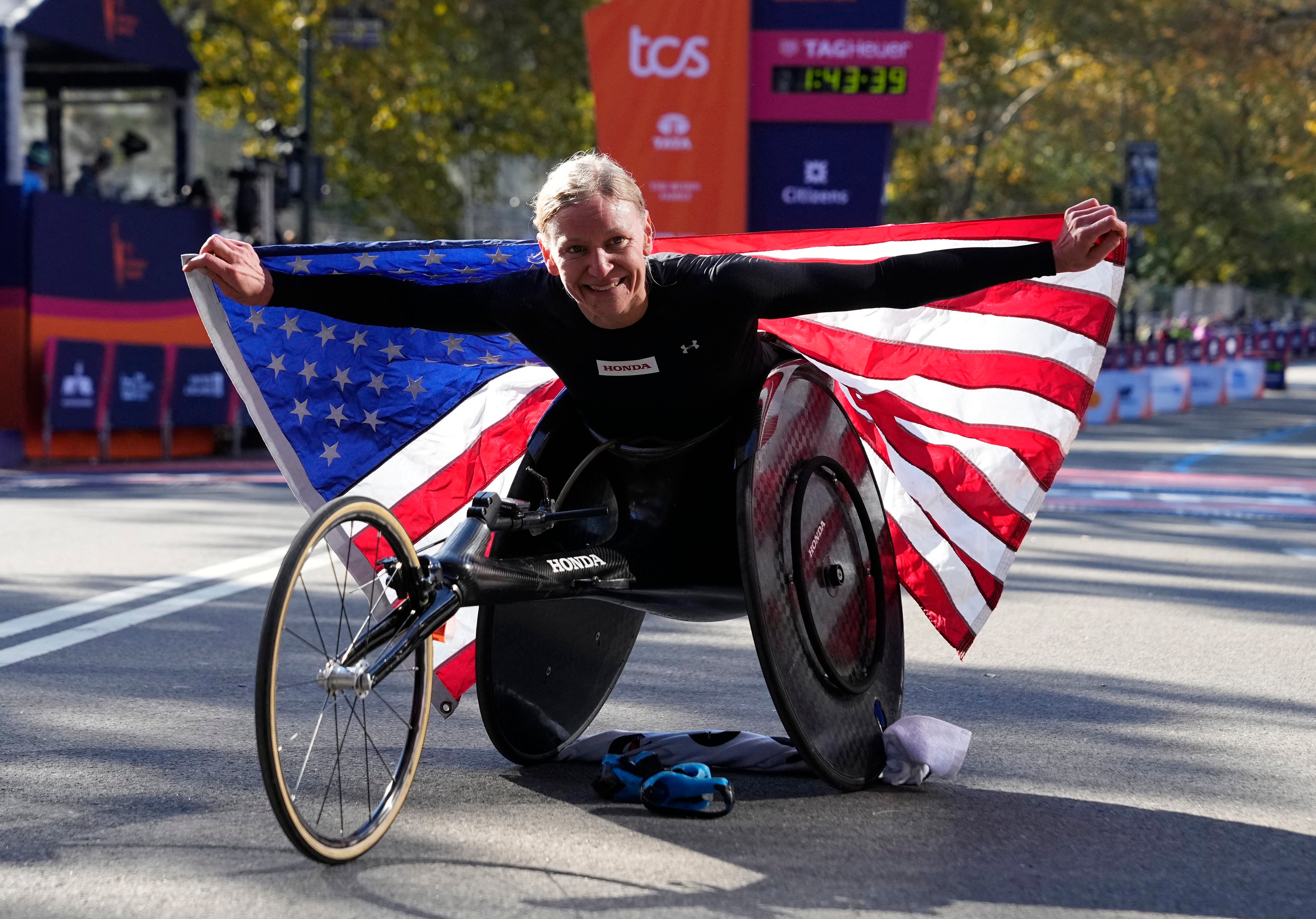 Susannah Scaroni celebrates winning the New York City Marathon