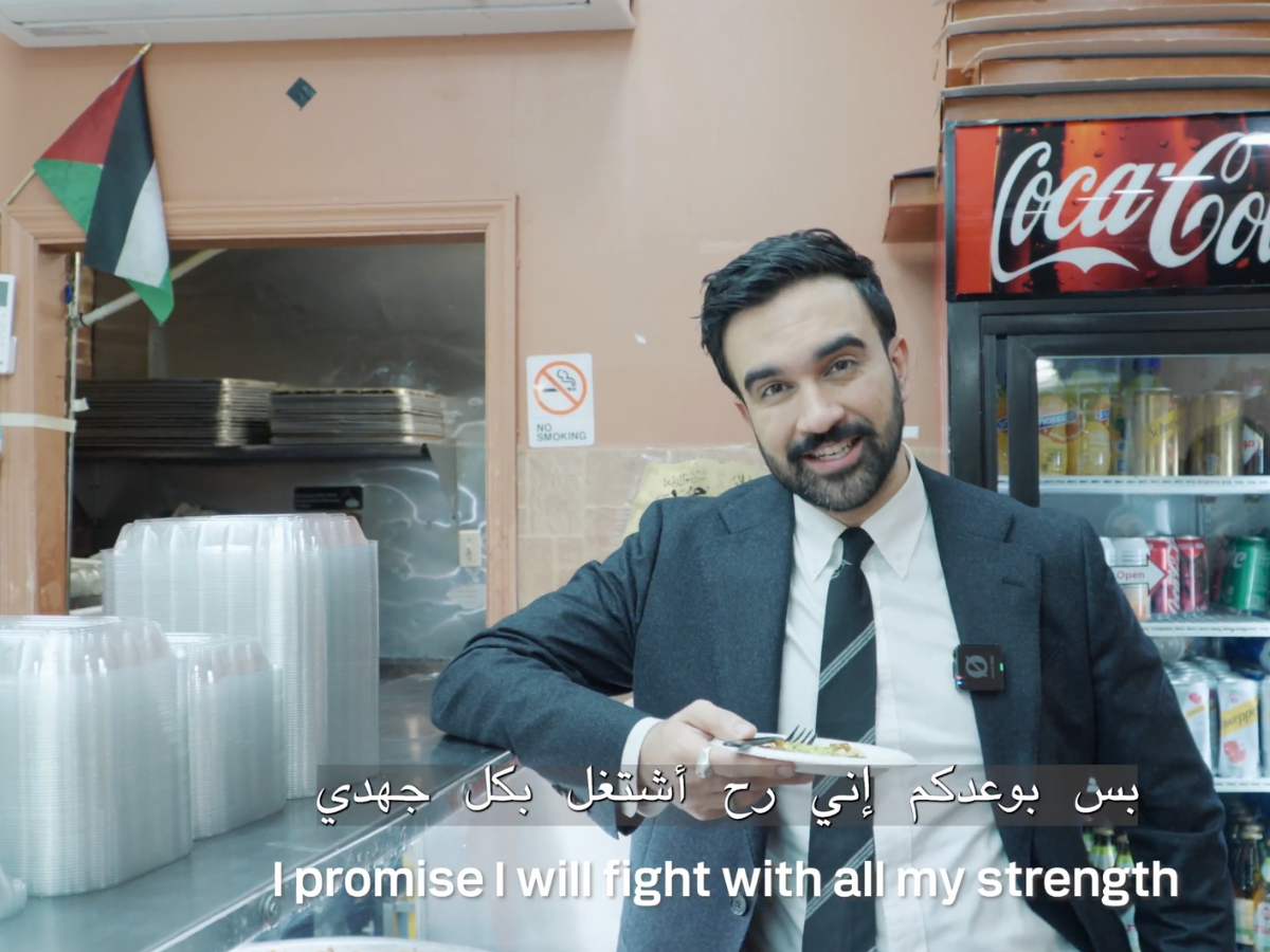 <p>Zohran Mamdani, who is Muslim and recently delivered a speech condemning Islamophobia, appears in the ad in a bodega with a Palestinian flag displayed behind the counter</p>