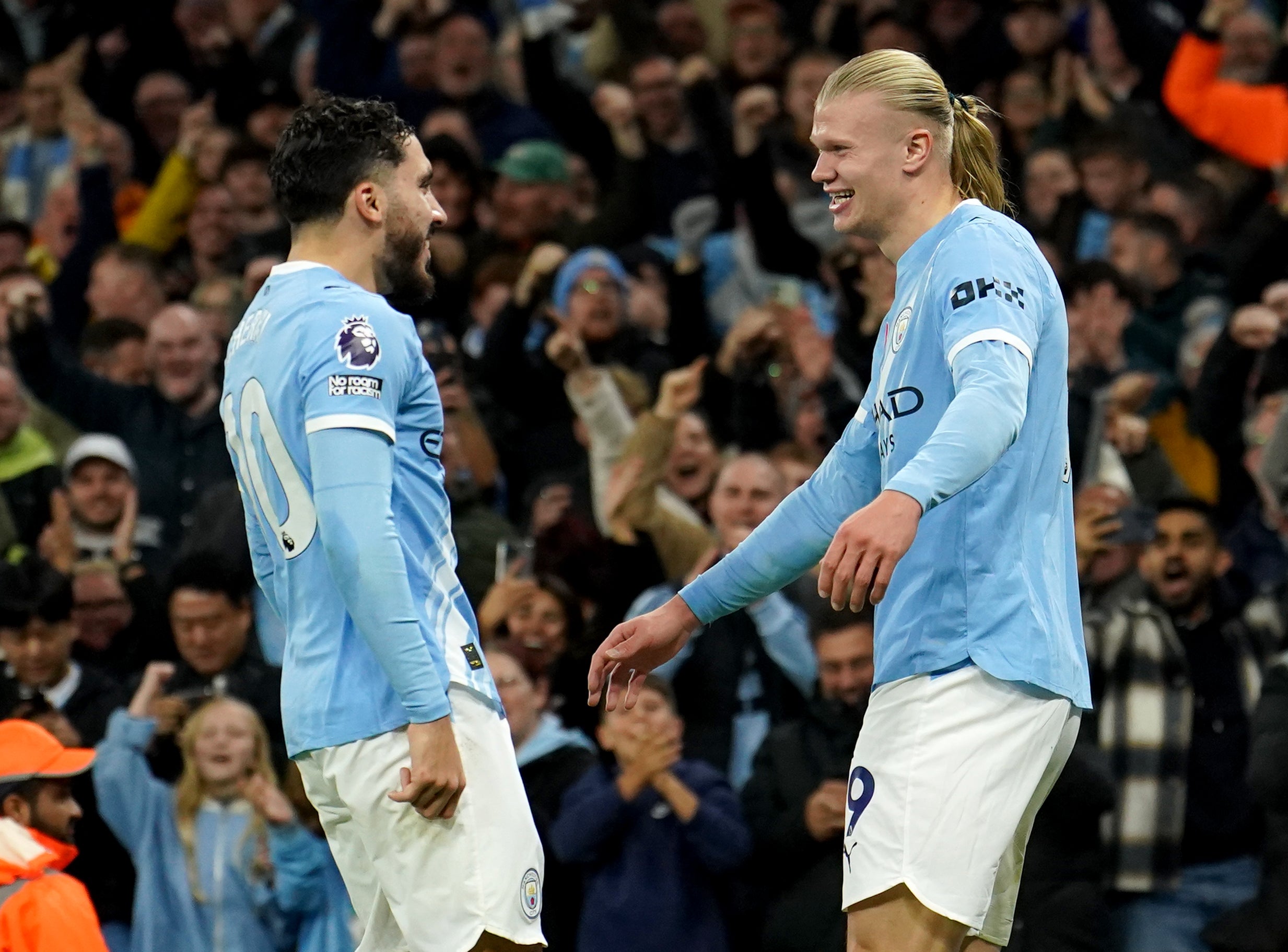 Rayan Cherki set up two of Haaland's goals