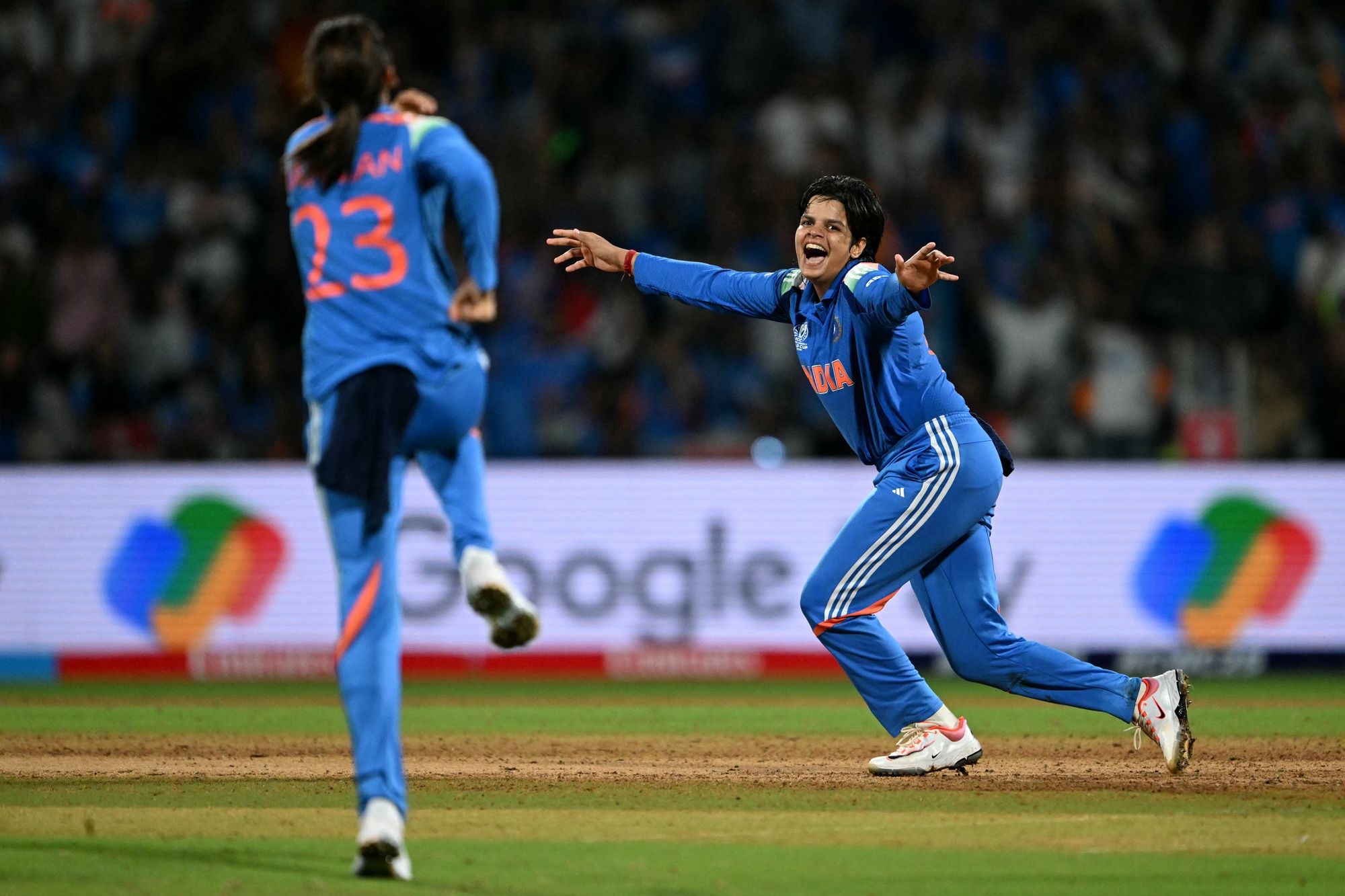 Verma celebrates with her team captain Harmanpreet Kaur after taking the wicket of South Africa's Sune Luus