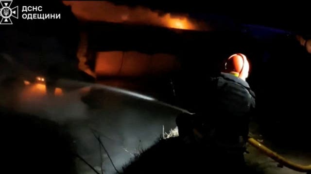 <p>A firefighter operates following a Russian drone strike in Odesa region</p>