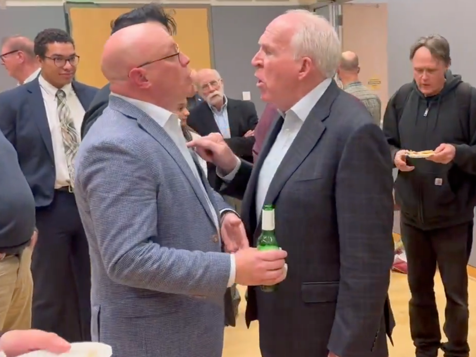 John Brennan was filmed poking a conservative activist who asked him the scandal related to Hunter Biden's laptop