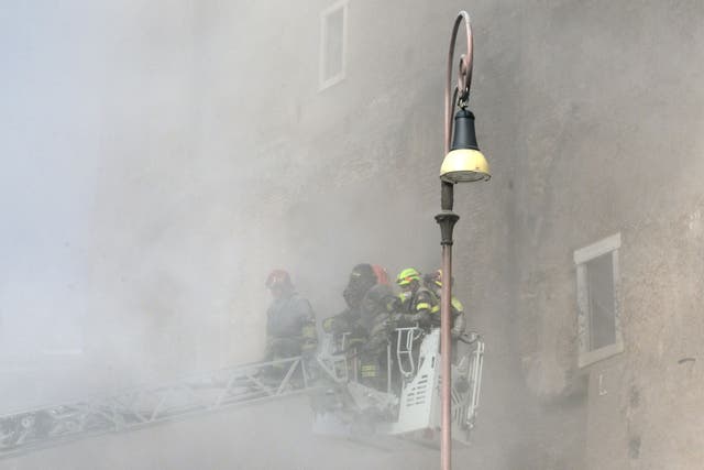 <p>Dust rises due to a second collapse of part of the medieval tower "Torre dei Conti"</p>