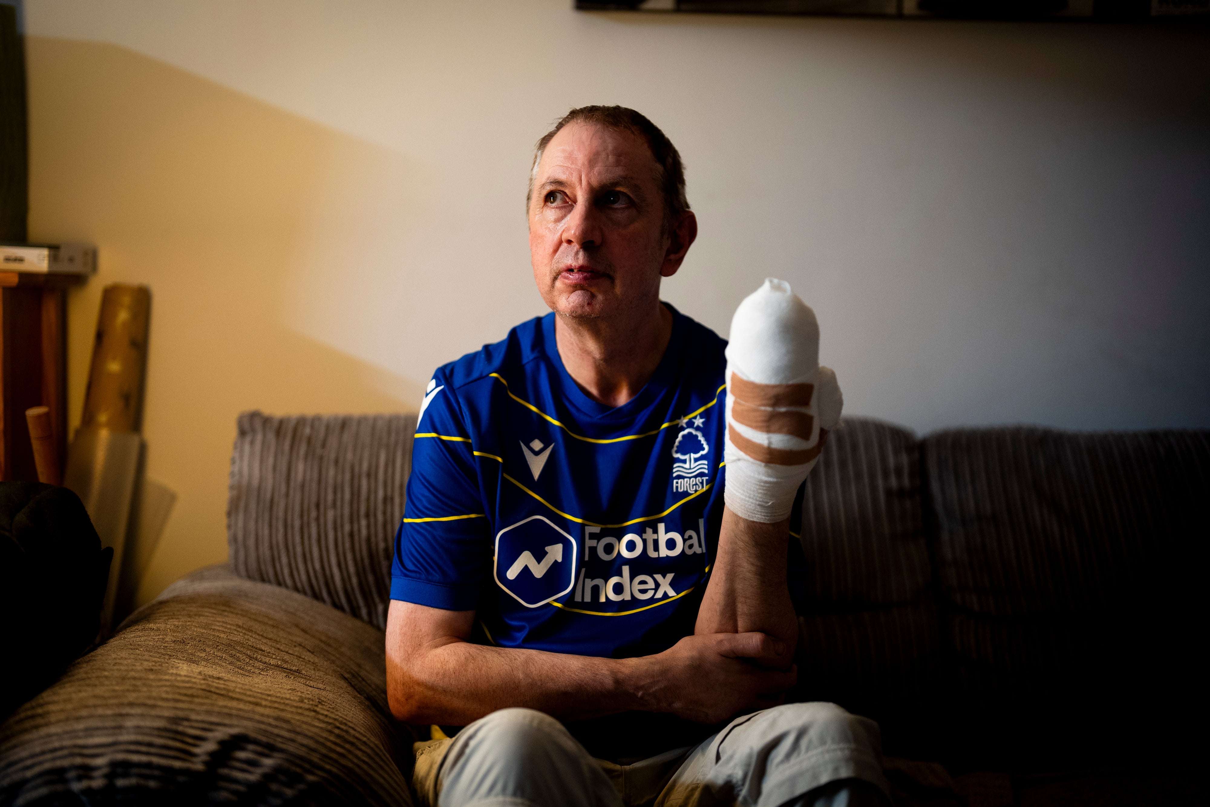 <p>Stephen Crean at his home in southwest London, who sustained multiple injuries after a number of people were stabbed on a train in Cambridgeshire</p>