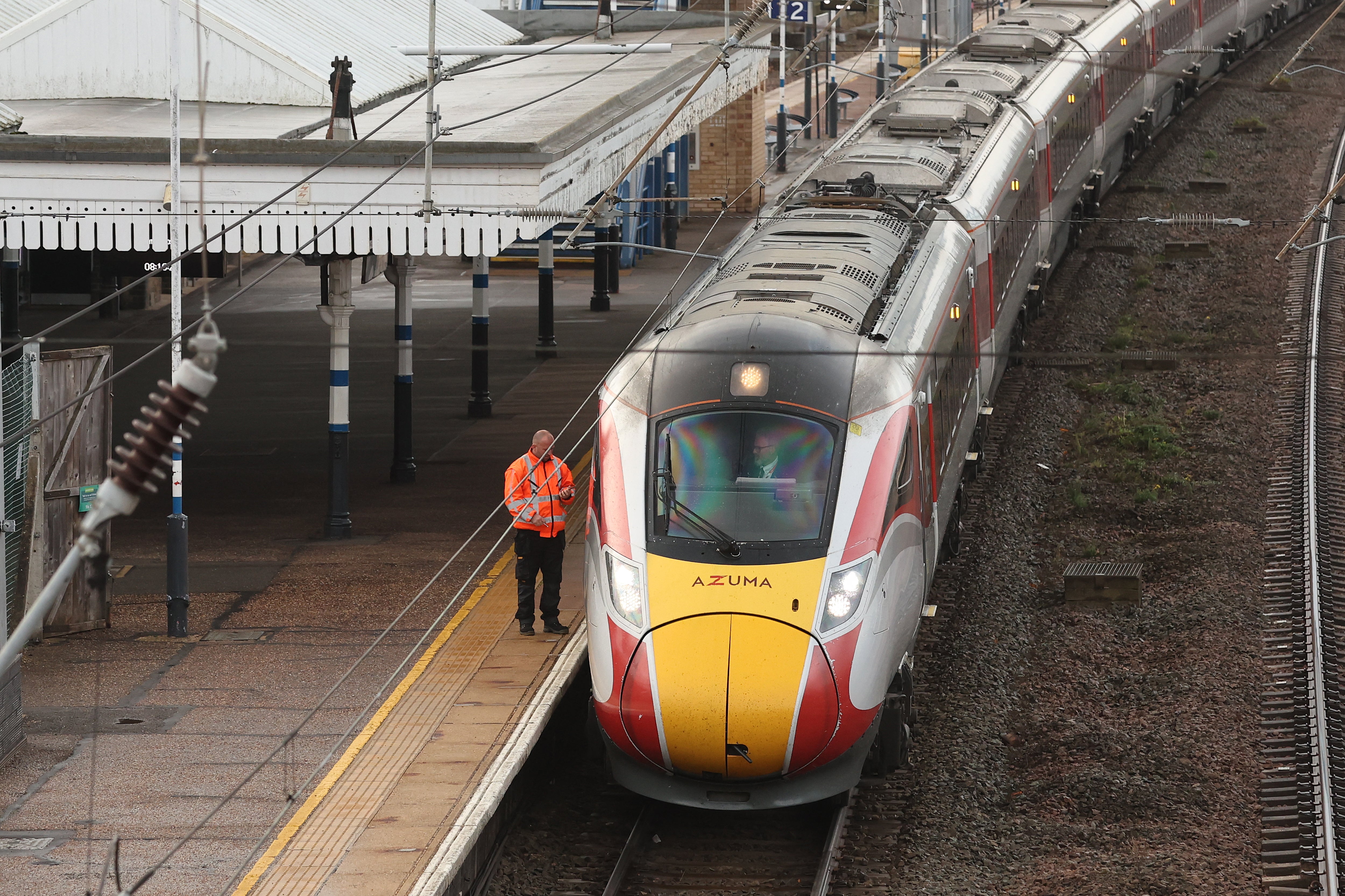 <p>Drivers prepare to move the LNER Azuma train, on which a mass stabbing took place</p>