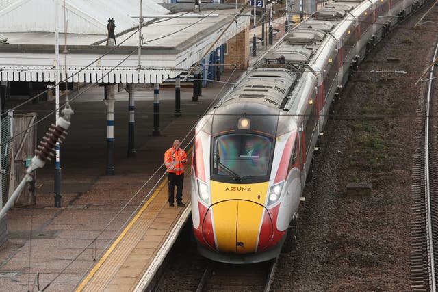 <p>Drivers prepare to move the LNER Azuma train, on which a mass stabbing took place</p>