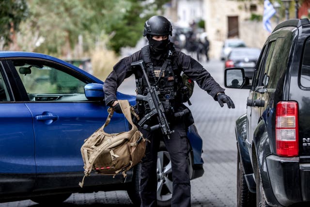 <p>Armed police following the incident on the Greek island of Crete</p>