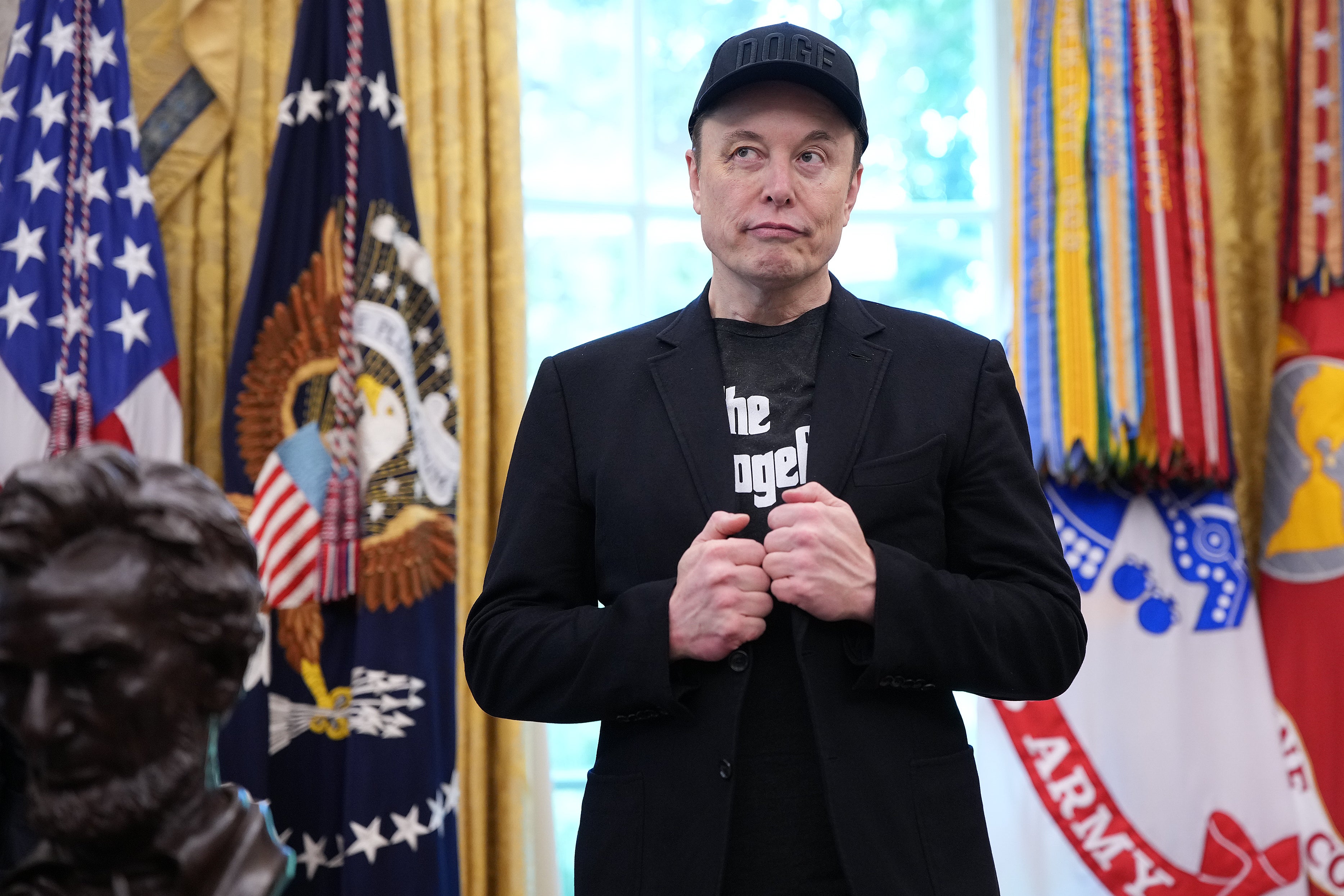 <p>Tesla CEO Elon Musk listens as U.S. President Donald Trump speaks to reporters in the Oval Office of the White House on May 30, 2025 in Washington, DC</p>