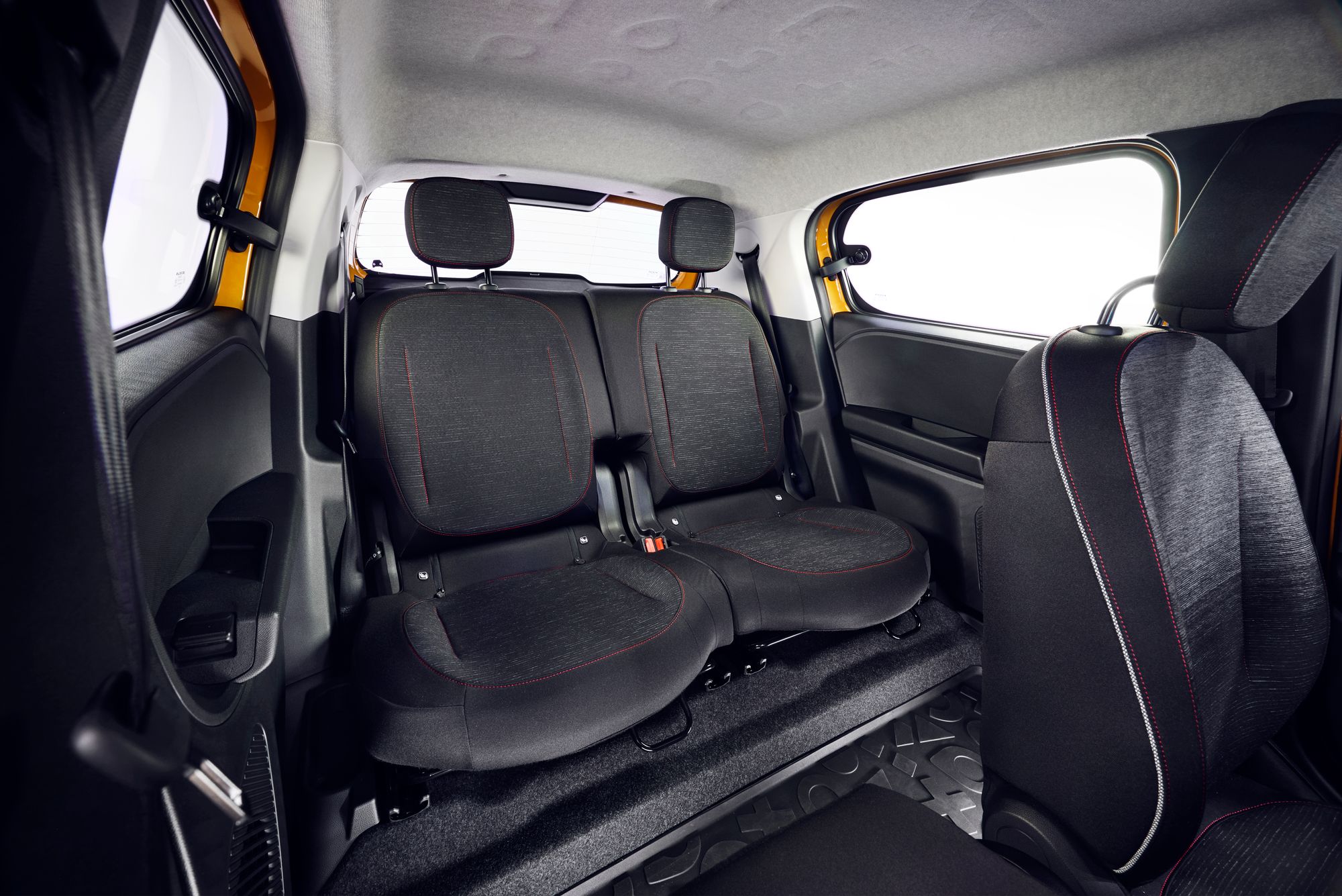 The new Renault Twingo is a four seater, but the seats fold and slide forwards to give more boot space