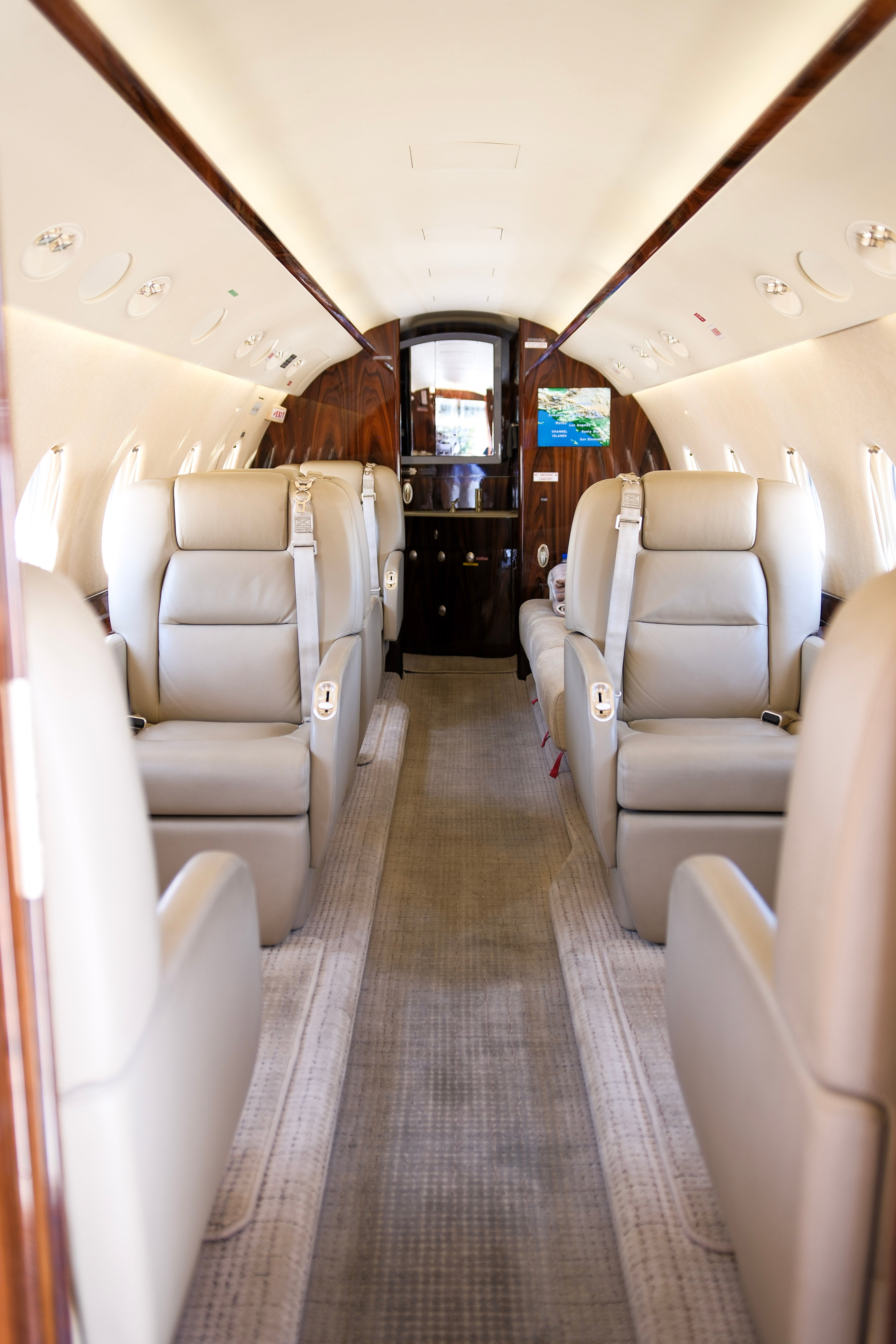 The luxury interior of the Gulfstream G200, which typically charters for $8,500-$11,000 per hour