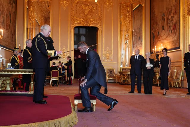 <p>Sir David Beckham is made a Knight Bachelor by the King during an investiture ceremony at Windsor Castle, Berkshire</p>