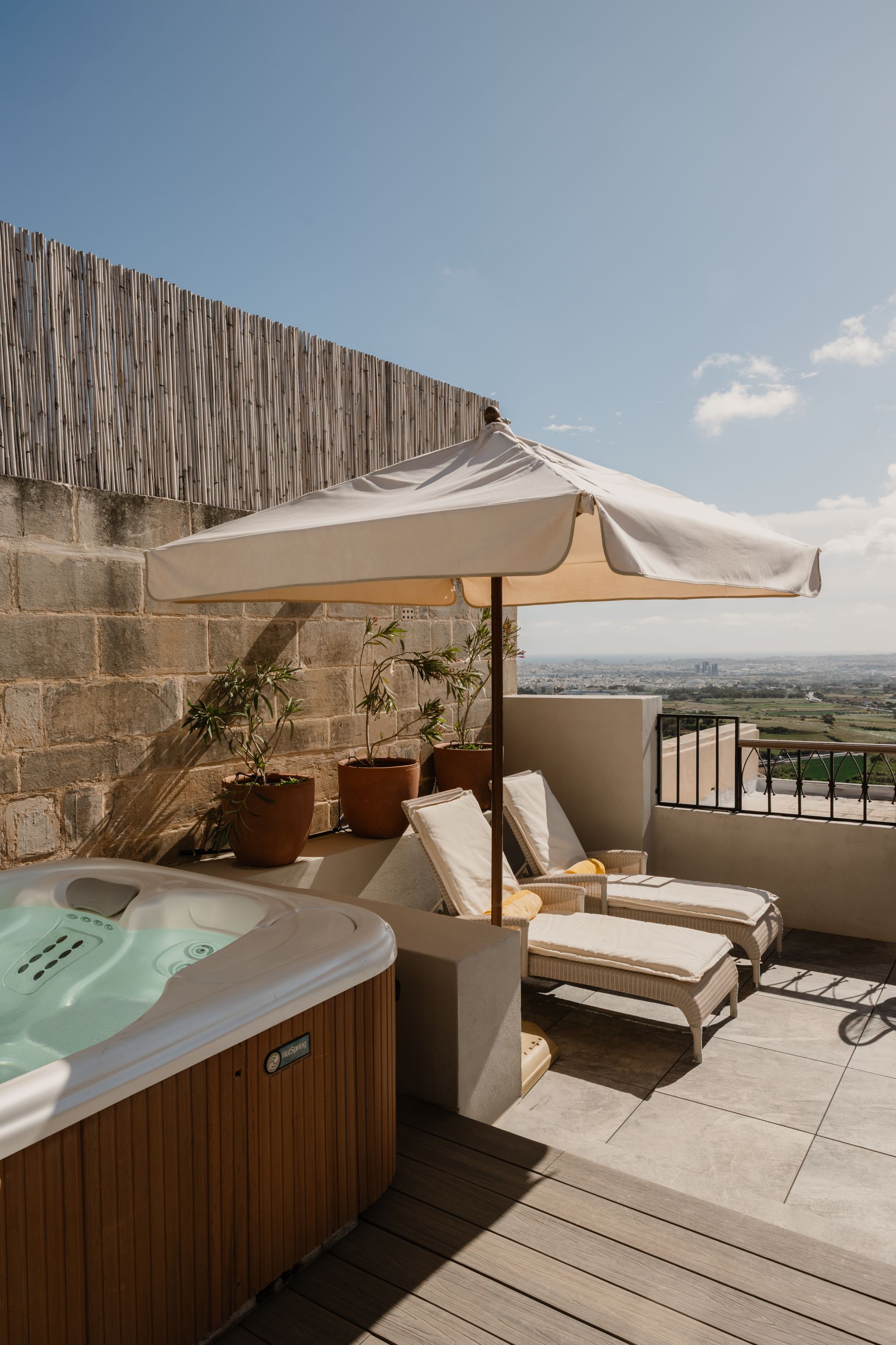 Some rooms feature a terrace and jacuzzi