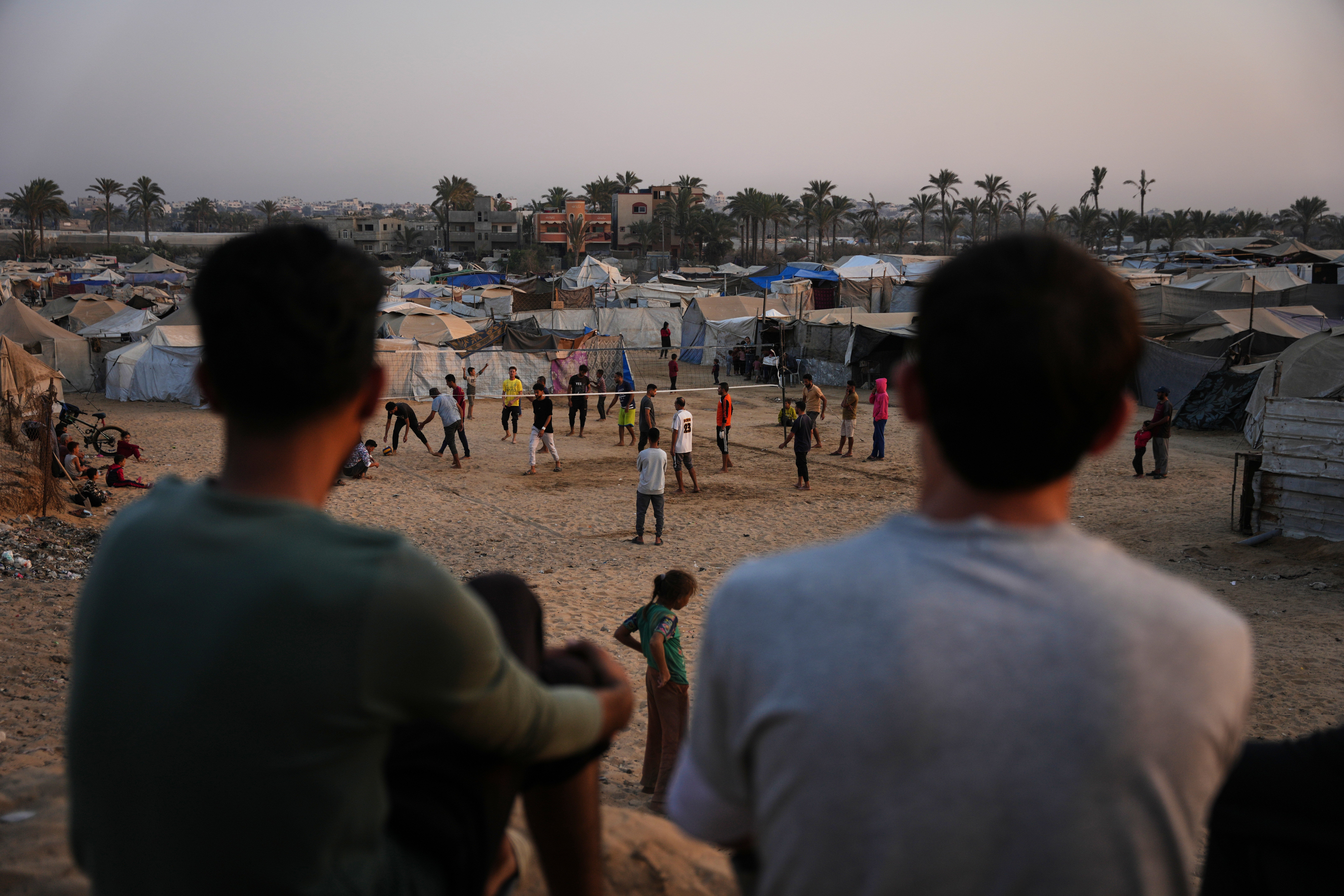 Palestinians play volleyball in Gaza