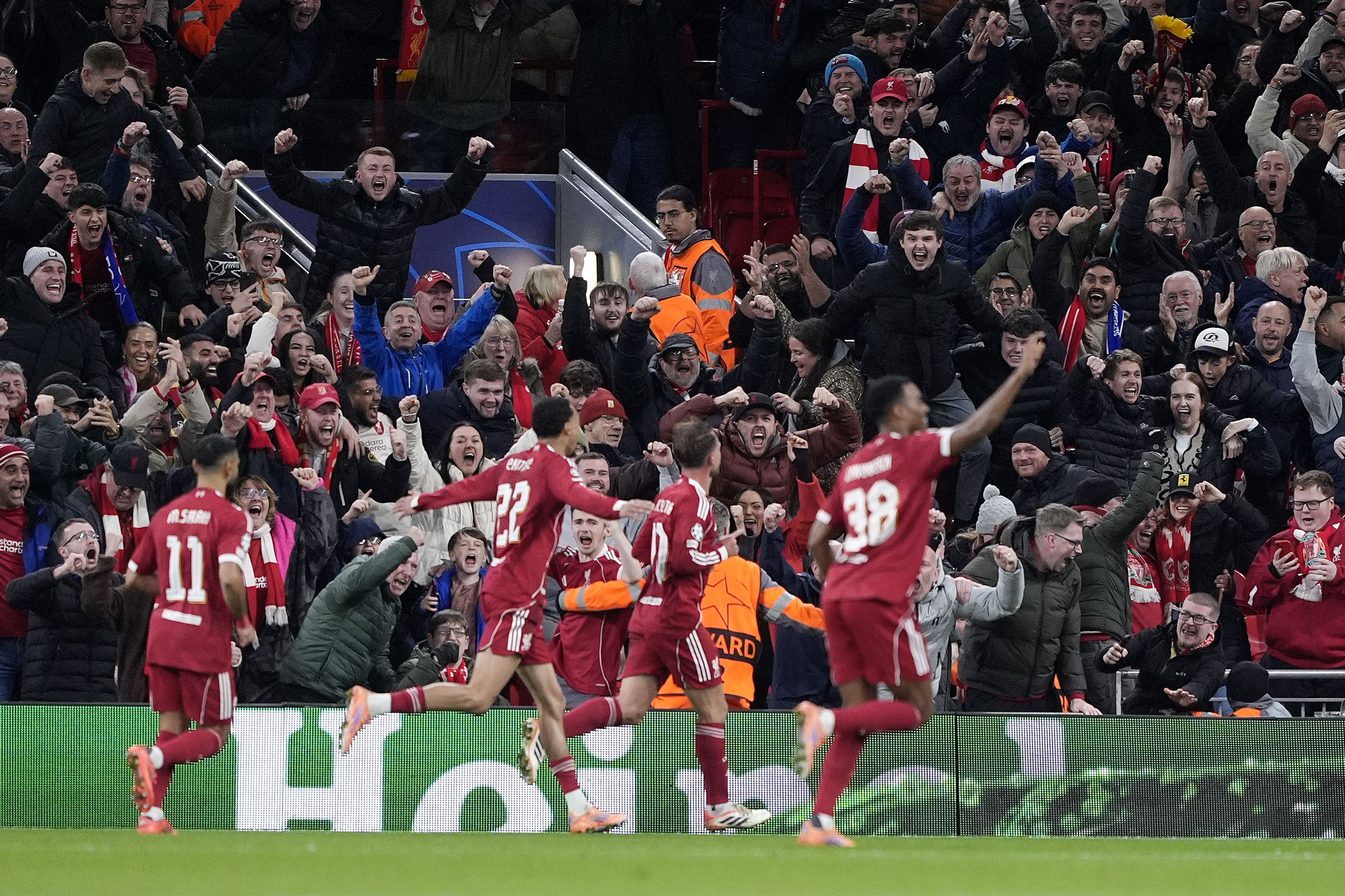 <p>Liverpool’s players celebrate after Alexis Mac Allister fired them in front against Real Madrid</p>