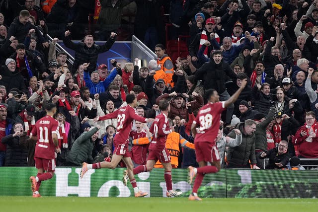 <p>Liverpool’s players celebrate after Alexis Mac Allister fired them in front against Real Madrid</p>