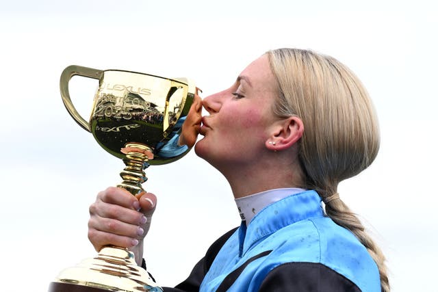 <p>Jamie Melham (pictured) kisses the Melbourne Cup</p>