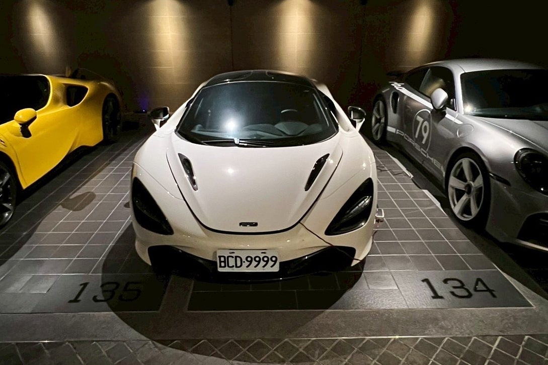 <p>Luxury sport vehicles are parked at one of the seized properties which belongs to the suspected head of a criminal scamming syndicate, in Taipei, Taiwan</p>