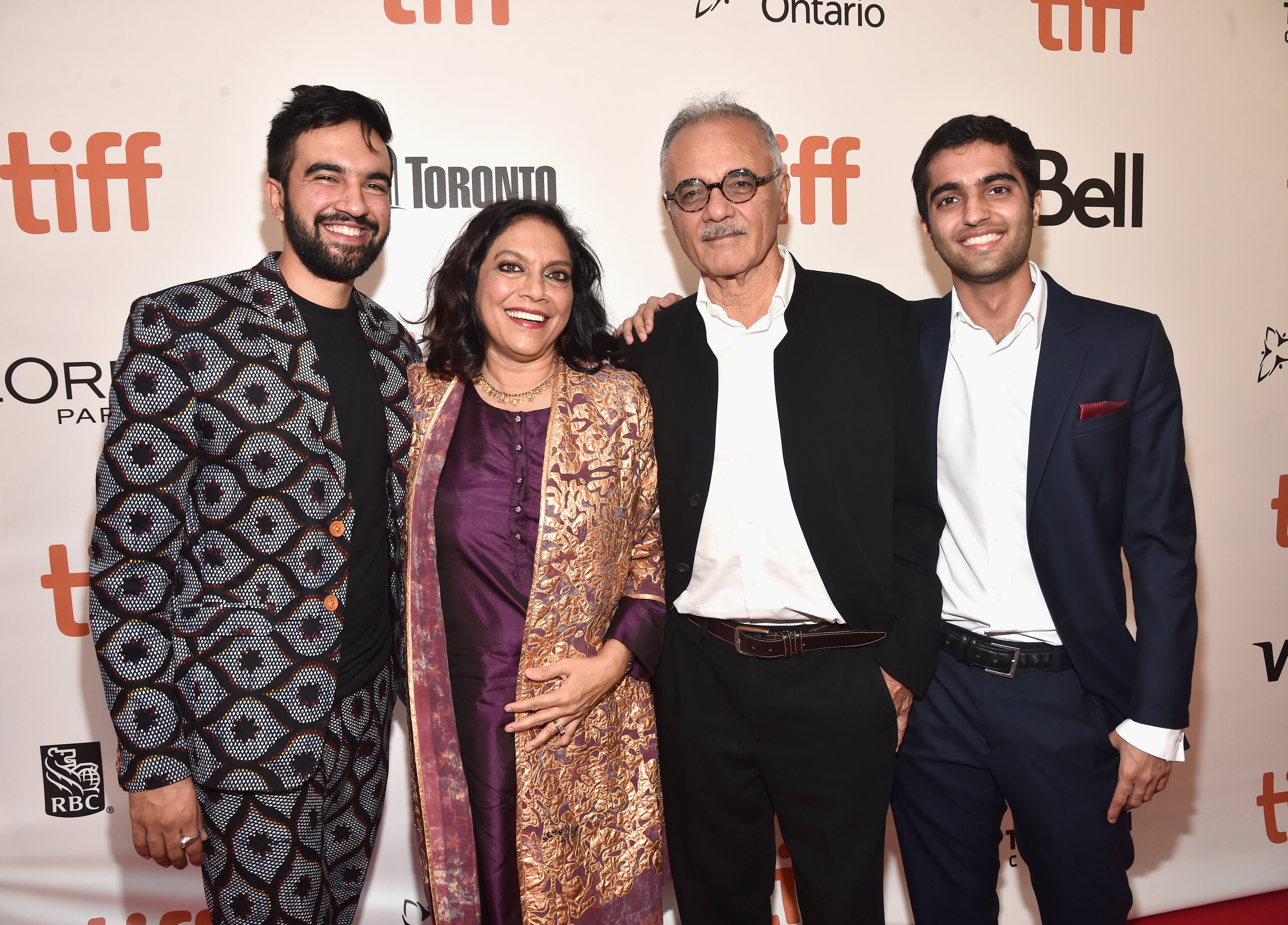 Mamdani (left) pictured with his film-director mother Mira Nair (second left) and his father Mahmood Mamdani (second right) in 2016