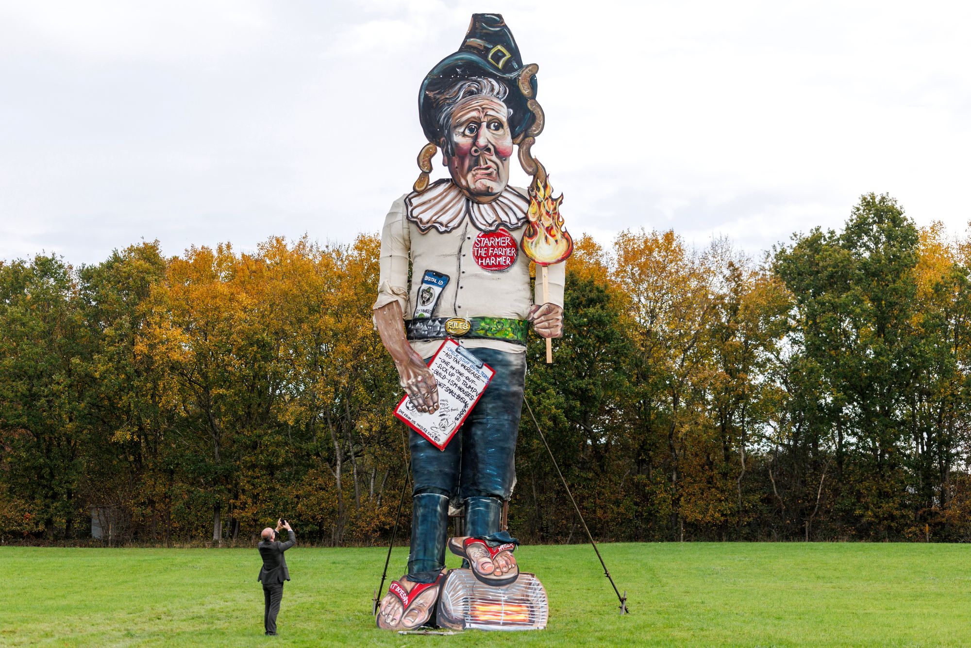 <p>Members of the Edenbridge Bonfire Society unveil an effigy depicting prime minister Keir Starmer, at Breezehurst Farm Industrial Park </p>