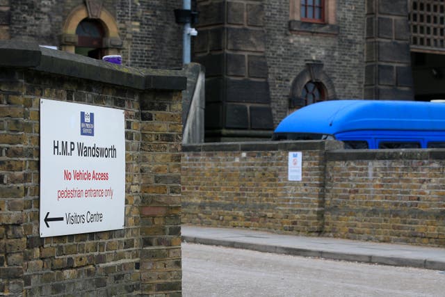 A sign outside HMP Wandsworth (Jonathan Brady/PA)