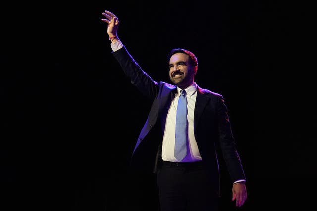 <p>Zohran Mamdani reacts as he walks on stage to speak at a mayoral election night watch party</p>