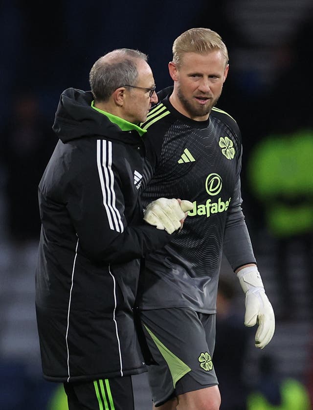 <p>Celtic interim manager Martin O'Neill and Celtic's Kasper Schmeichel celebrate after the match </p>