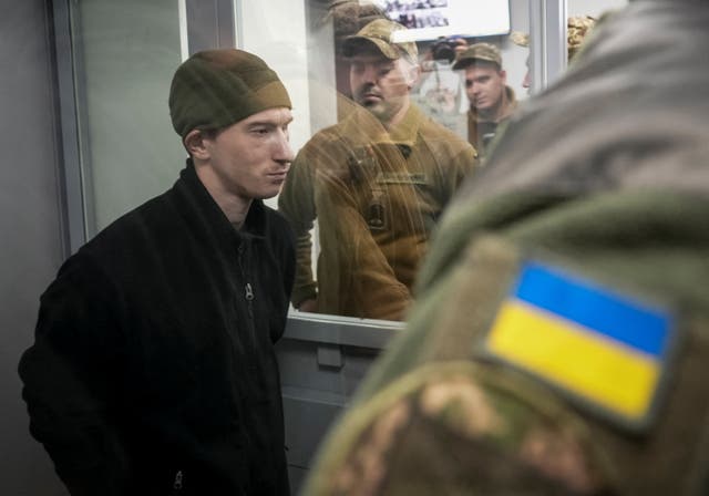 <p>Dmytro Kurashov, accused of committing a war crime by executing a Ukrainian serviceman who had surrendered during combat, attends a court hearing on Thursday</p>
