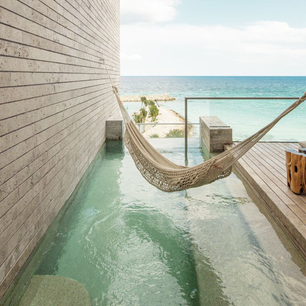 Each suite boasts a private terrace with a plunge pool