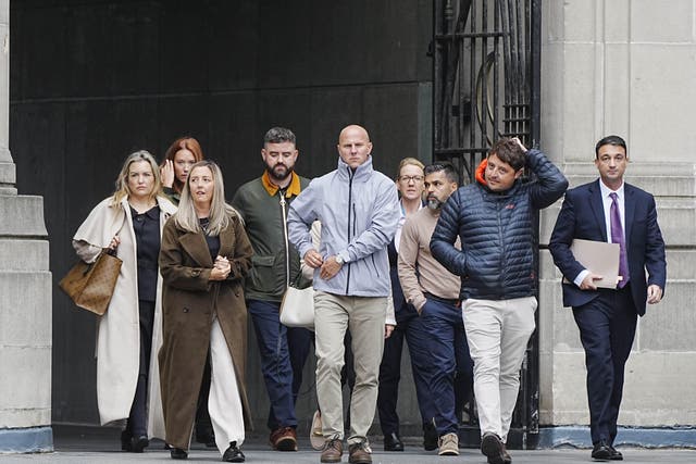 Families of the victims with their legal team arrive at Liverpool Town Hall for the Southport Inquiry (Peter Byrne/PA)