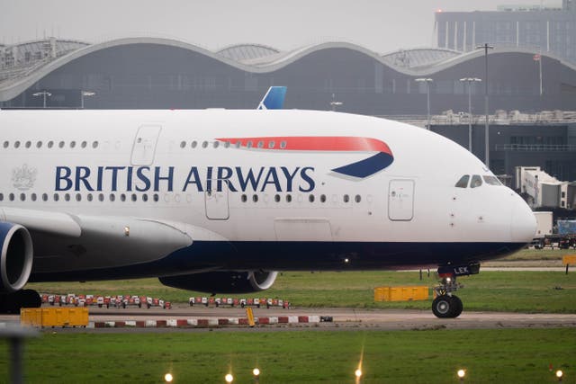 Shares in British Airways owner International Airline Group fell by up to 10% in early trading on Friday (James Manning/PA)