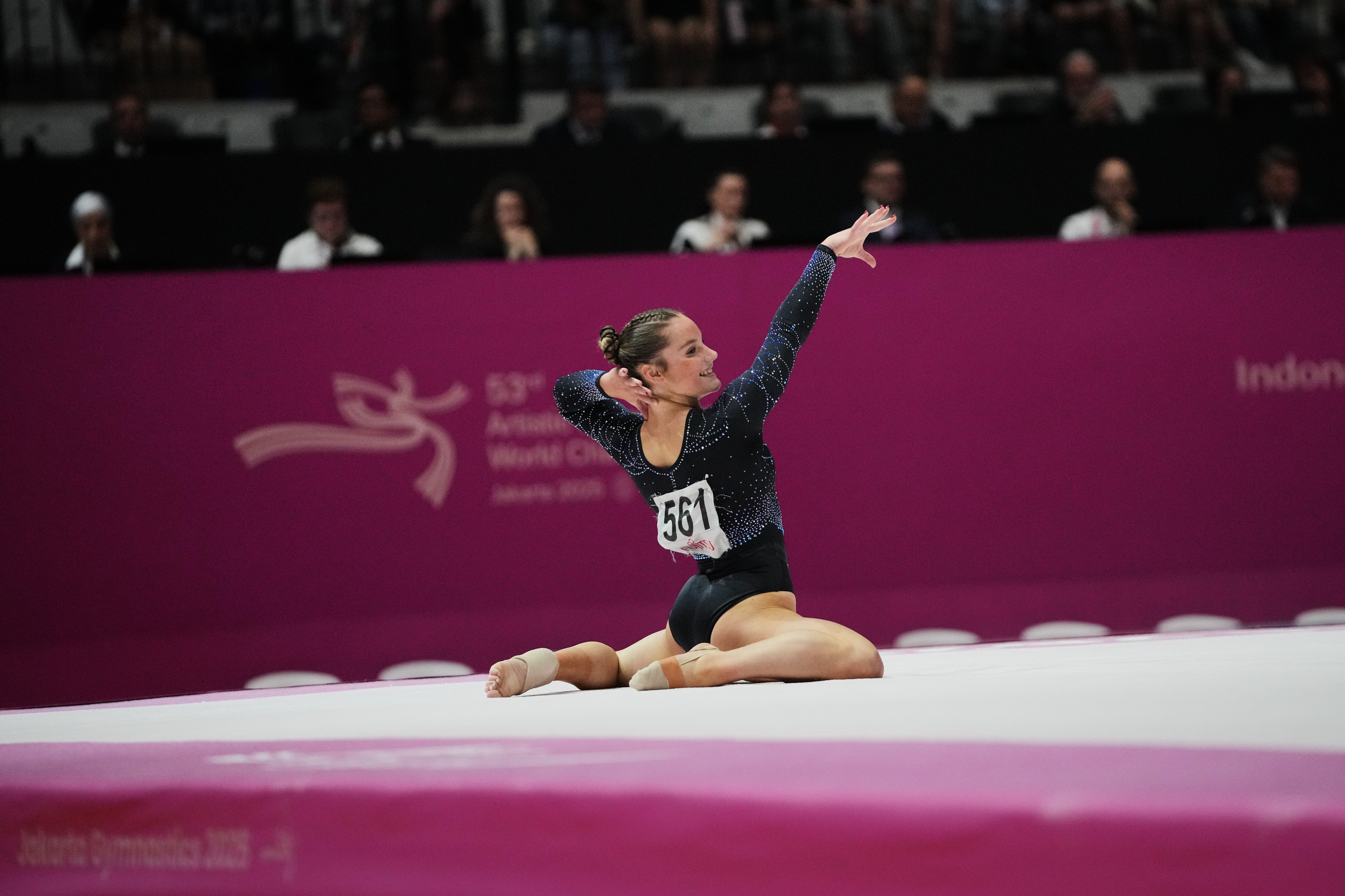 The 17-year-old endured a nervous wait after competing second of eight finalists in the floor final