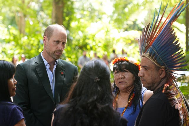 The Prince of Wales speaks with representatives and leaders of Indigenous Peoples, who come from many different parts of Brazil (Aaron Chown/PA)