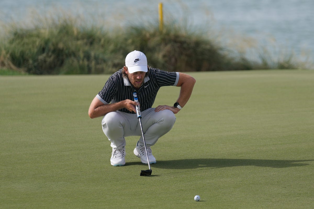 Tommy Fleetwood and Aaron Rai have two-shot halfway lead in Abu Dhabi Tommy Fleetwood and Aaron Rai have two-shot halfway lead in Abu Dhabi