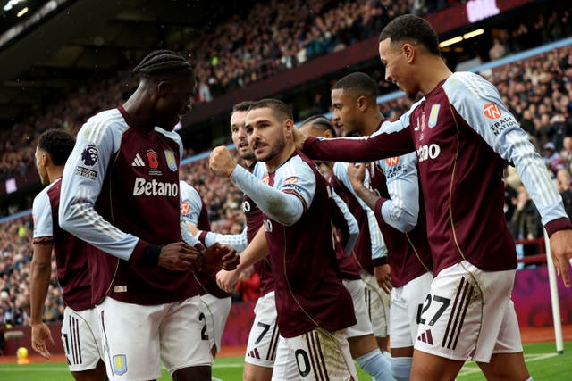 Emiliano Buendia (centre) celebrates firing Aston Villa ahead in their 4-0 win over Bournemouth (Barrington Combs/PA).