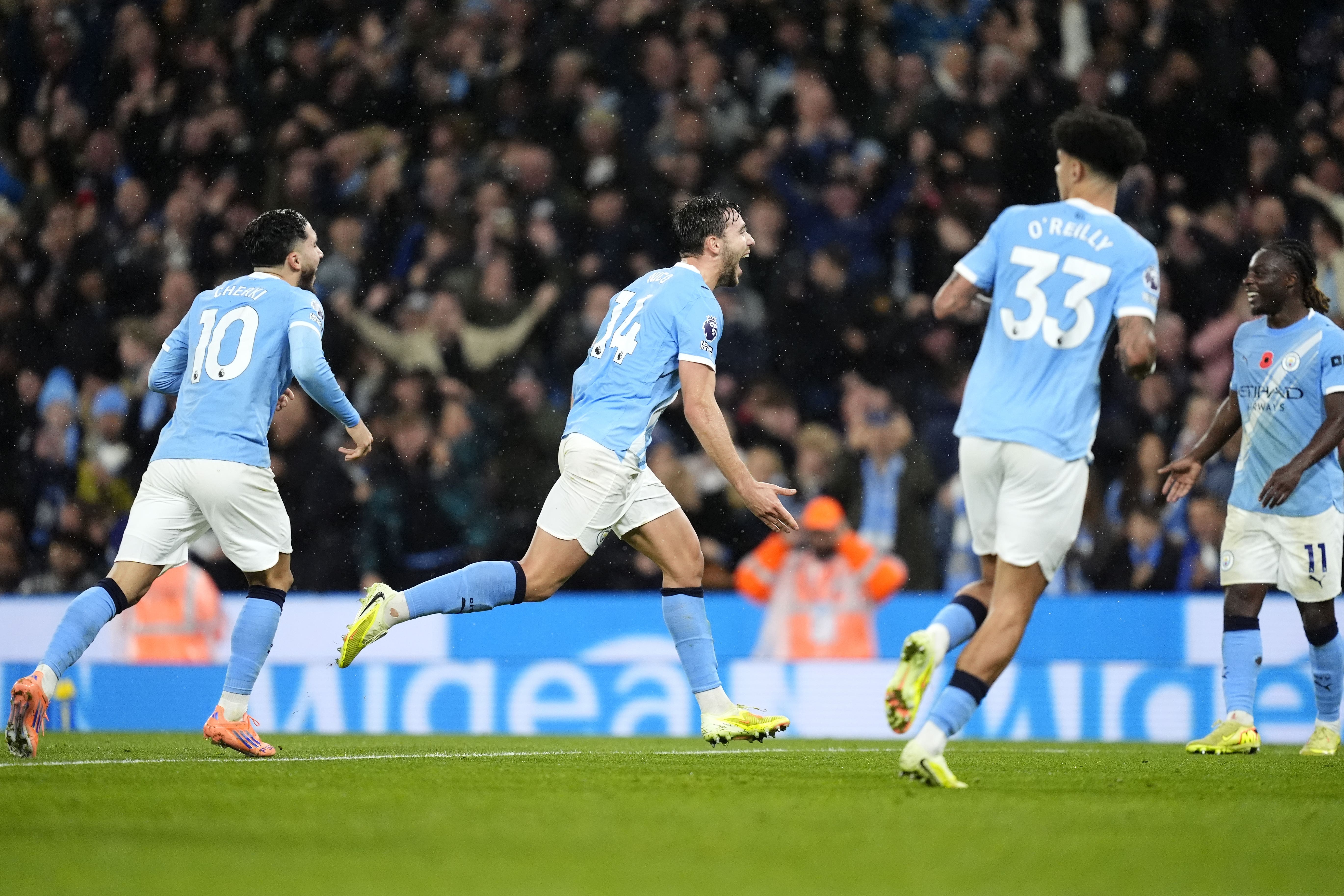 Manchester City eased past Liverpool to climb up to second in Pep Guardiola’s landmark match as manager (Nick Potts/PA)