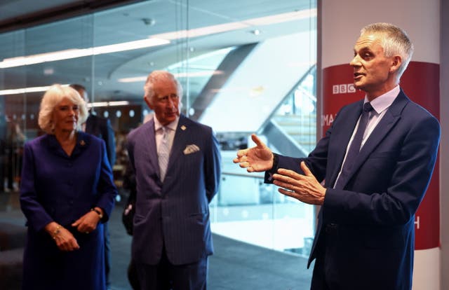 <p>Tim Davie with Charles and Camilla during a visit to the BBC World Service at BBC Broadcasting House in 2022 (PA)</p>